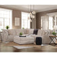 Sunset Sectionals 5-piece modular sectional in cream fabric with deep seating, matching throw pillows, and an ottoman.