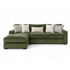 Sunset Sectionals Ivy sofa chaise sectional in soft green fabric with reversible cushions and patterned throw pillows.
