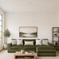 Sunset Sectionals Ivy deep-seated green fabric sofa chaise sectional with reversible cushions in a cozy living room.