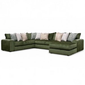 Sunset Sectionals Ivy U-shape sectional in green velvet with deep seating, reversible cushions, and decorative pillows.