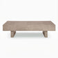 Sunset Sectionals Jorlaina rectangular cocktail table in light gray wire-brushed oak veneer with a double plinth base.