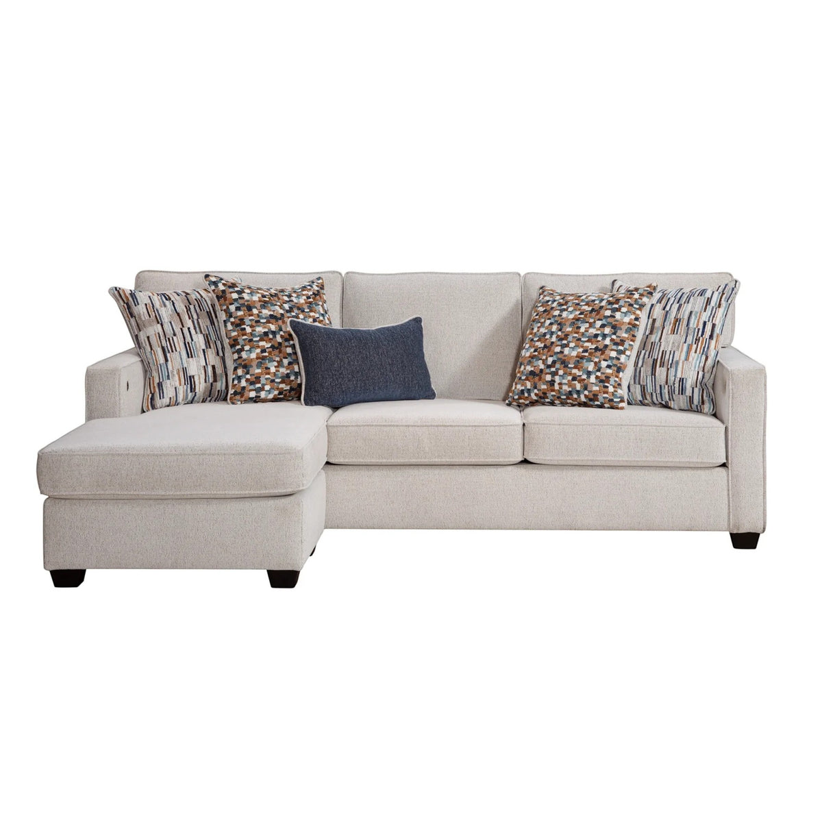 Sunset Sectionals Michigan reversible sofa chaise in light beige fabric with patterned throw pillows